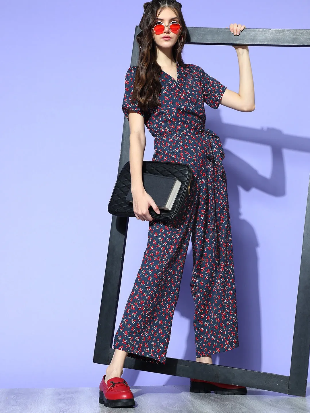 Berrylush Women Navy Blue & Red Floral Printed Shawl Neck Waist Tie-Up Culotte Jumpsuit